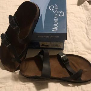 Black “birk” like sandals. Mountain Sole. Size 10